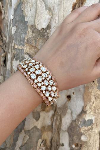 Gold plated pink polki bangle