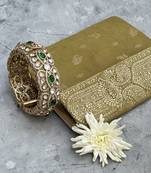 Gold plated green kundan bangle