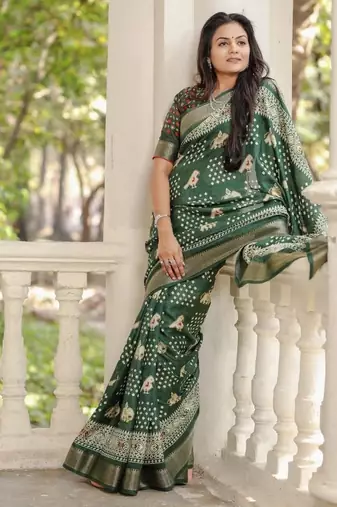Green soft dola silk blend simple patola printed saree