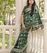 Green soft dola silk blend simple patola printed saree
