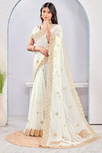 White zari embroidered silk blend saree with blouse piece