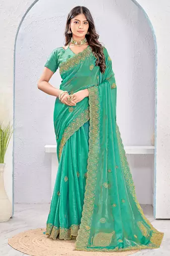 Rama zari embroidered silk blend saree with blouse piece