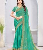 Rama zari embroidered silk blend saree with blouse piece