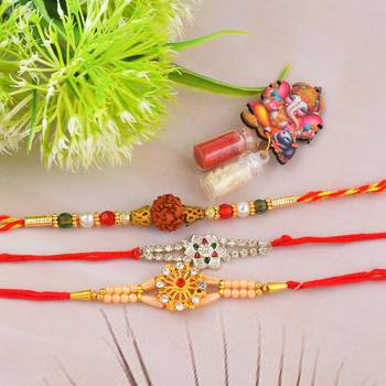 Rakhi for bhaiya bhabhi- brass micron gold plated, one pure silver with one rudraksh (pack of 3) 1