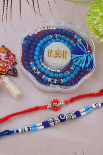 Rakhi for bhaiya bhabhi- one long wraparound with one silver charm red rakhi   (pack of 2)