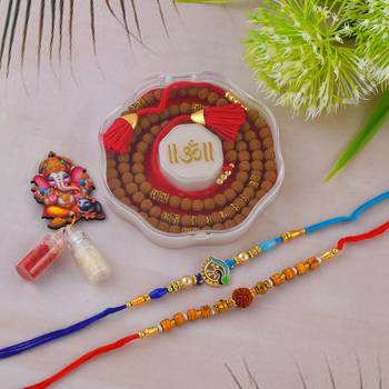 Rakhi for bhaiya bhabhi- one long tulsi bead wraparound with one pure silver charm and one rudraksh   (pack of 3 ) 1