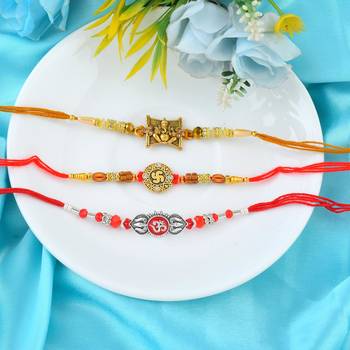 Rakhi for bhaiya bhabhi-brass gold plated, pure silver and swastik rakhi for rakshabandhan (pack of 3) 1