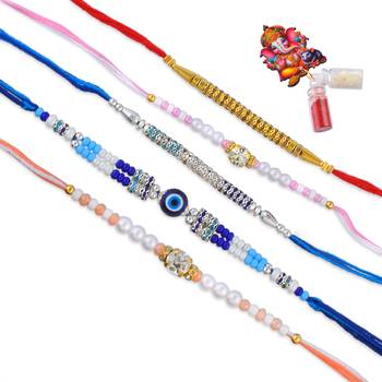 Rakhi for bhaiya bhabhi-pearl, cz and evil eye rakhi set for rakshabandhan with silver coin (pack of 5) 2