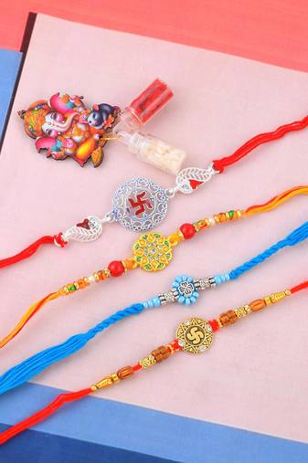 Pure silver and fabric rakhi for bhaiya bhabhi for rakshabadhan (pack of 4 )