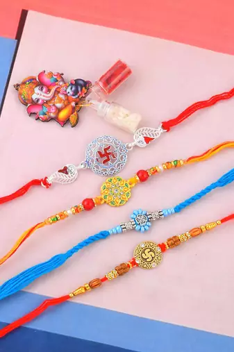 Pure silver and fabric rakhi for bhaiya bhabhi for rakshabadhan (pack of 4 )