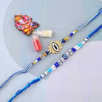 Ceramic evil eye combo rakhi for bhaiya bhabhi with 50% silver content lakshmi ganesh coin (pack of 2) 1