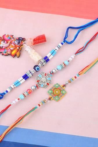 Pure silver and beaded traditional rakhi for bhaiya bhabhi for rakshabandhan (pack of 3)