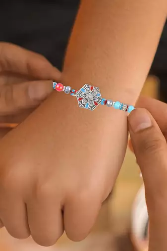 Pure silver and beaded traditional rakhi for bhaiya bhabhi for rakshabandhan (pack of 3)