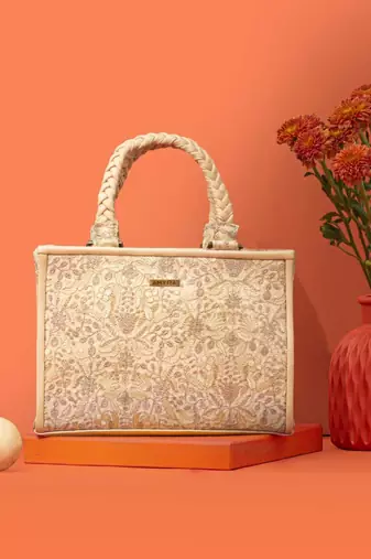 Beige silk embroidered handbag