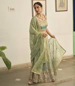Turquoise embroidered TISSUE Lehenga