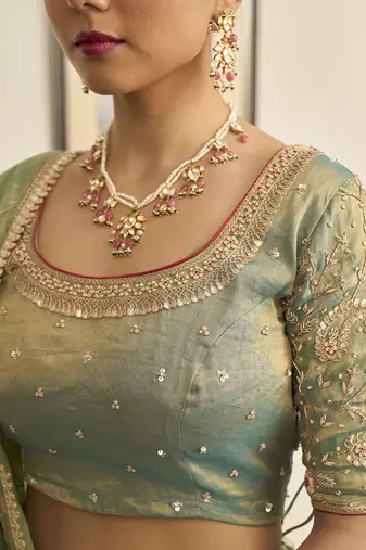 Turquoise embroidered TISSUE Lehenga