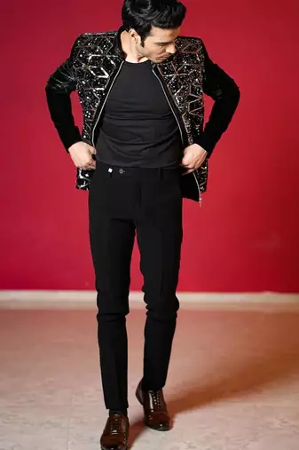 Black velvet bomber jacket with golden geometic sequins embroidery