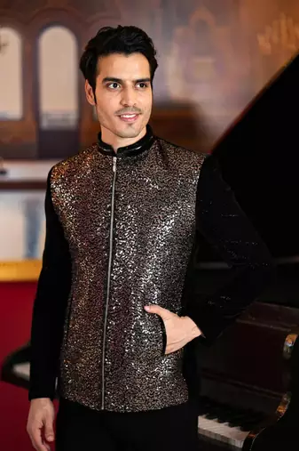Black velvet bomber jacket with copper sequins embroidery