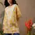 Hand embroidered floral printed yellow cotton lucknowi chikankari short kurti