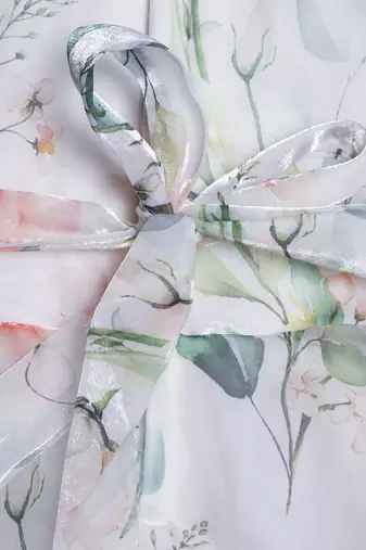 Offwhite floral print with floral bow organza party gown