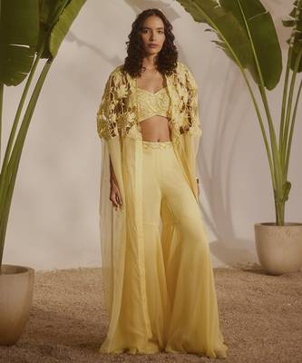 Yellow plain organza pant paired with embroidered blouse and cape 1