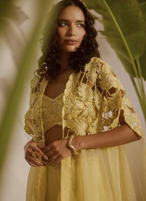 Yellow plain organza pant paired with embroidered blouse and cape 4