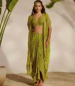 Green plain organza pant paired with embroidered blouse and cape