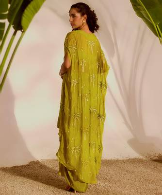 Green plain organza pant paired with embroidered blouse and cape 4