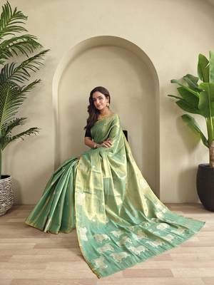 sea green zari tissue weaving saree with all over pichwai pattern 1