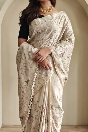 Beige loom tussar saree with all over designer embroidery
