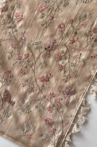 Beige loom tussar saree with all over designer embroidery