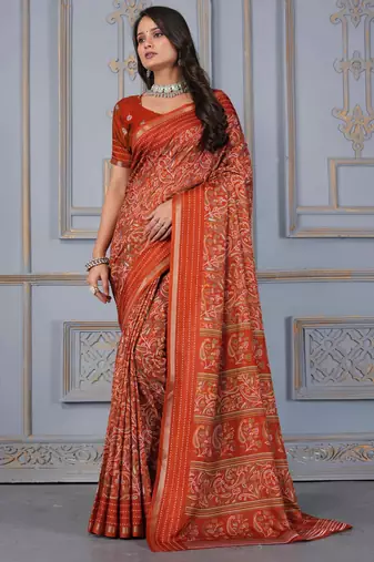 Rust soft cotton crape floral prints with thread woven border with blouse