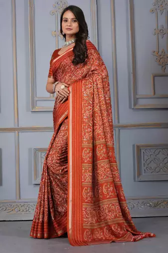 Rust soft cotton crape floral prints with thread woven border with blouse