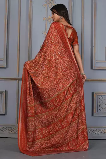 Rust soft cotton crape floral prints with thread woven border with blouse