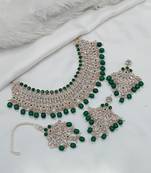 Elegant  gold-plated kundan pearl bridal jewelry set traditional handcrafted necklace, earrings and maang tikka