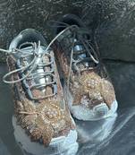 Gold leather embroidered sneakers