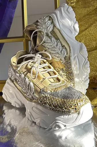Gold leather embroidered sneakers