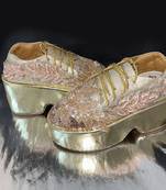 Gold leather embroidered sneakers