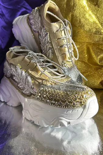 Gold leather embroidered sneakers