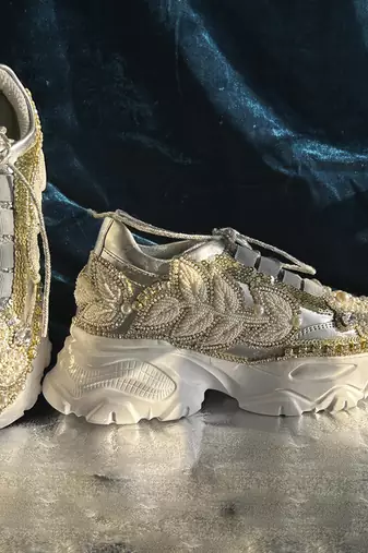 Gold leather embroidered sneakers