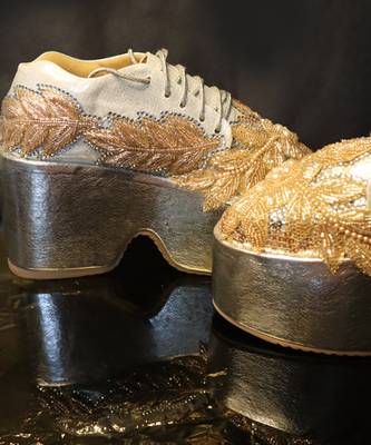 Gold leather embroidered sneakers 5