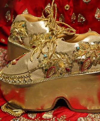 Gold leather embroidered sneakers 1