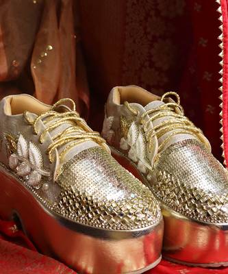 Gold leather embroidered sneakers 1