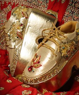 Gold leather embroidered sneakers 5