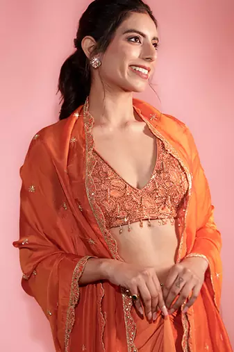 Rust satin plain skirt with dupatta & embroidered blouse