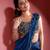 Blue organza embroidered saree with scallop border