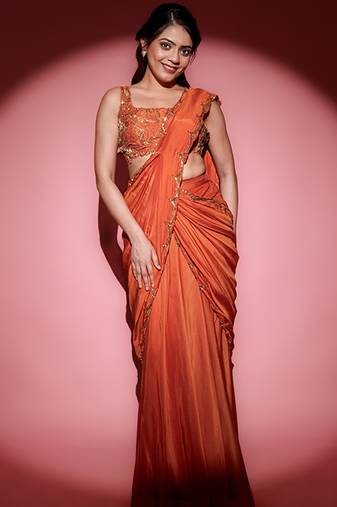 Rust organza embroidered saree with scallop border