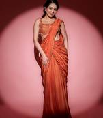 Rust organza embroidered saree with scallop border