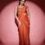 Rust organza embroidered saree with scallop border