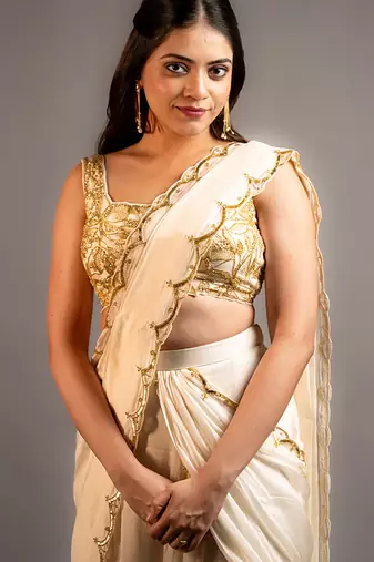 White organza embroidered saree with scallop border